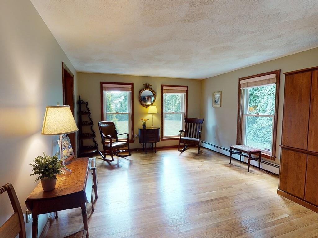 17 Nyra Road Stow, MA 01775 - Photo 15 of 26 a view of a livingroom with workspace and a window