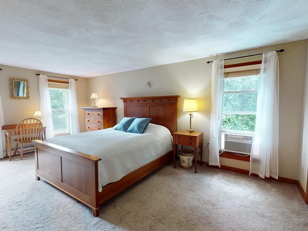 17 Nyra Road Stow, MA 01775 - Photo 19 of 26 a bedroom with a bed and a window