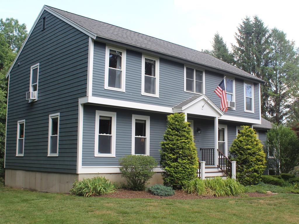 17 Nyra Road Stow, MA 01775 - Photo 2 of 26 a front view of a house with garden