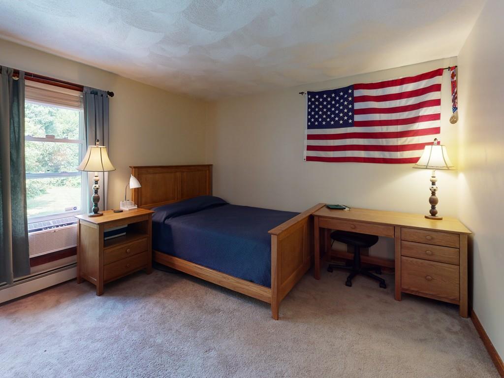 17 Nyra Road Stow, MA 01775 - Photo 21 of 26 a bedroom with a bed and a desk