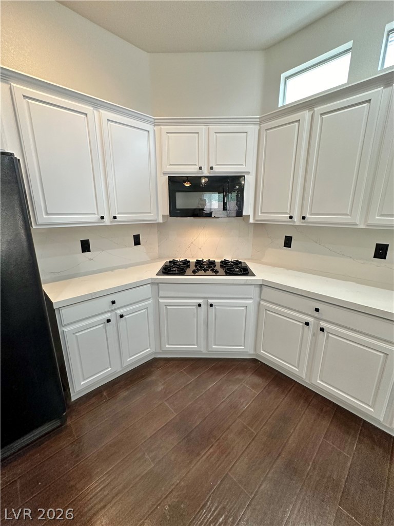 9996 Liberty View Road Las Vegas, NV 89148 - Photo 56 of 64 5 BURNER GAS COOKTOP AND 2 WALL OVENS.