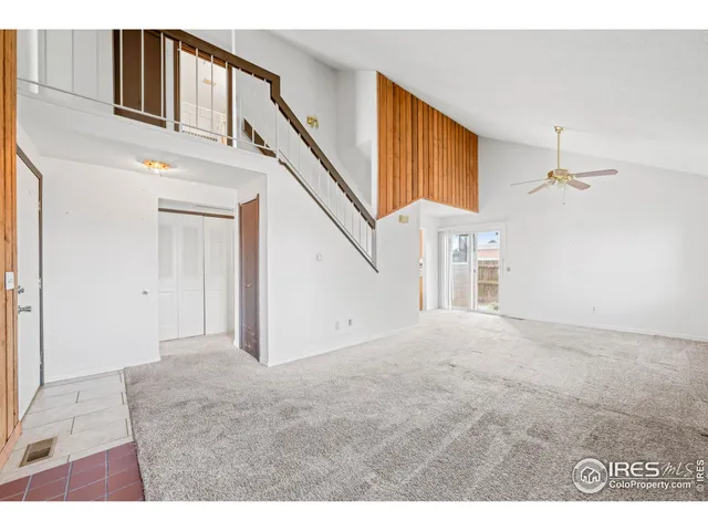a view of an entryway with stairs