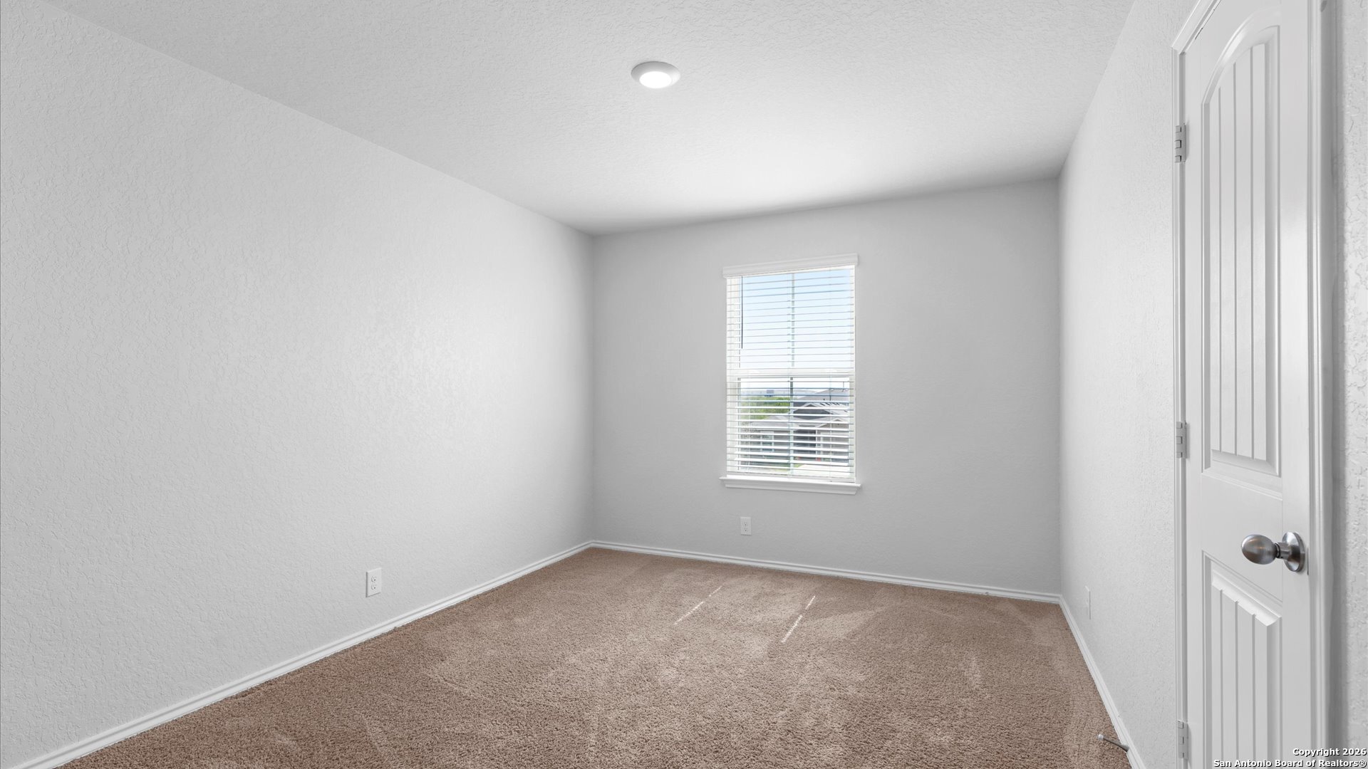 7602 Powder Gorge Converse, TX 78109 - Photo 12 of 17 an empty room with a window