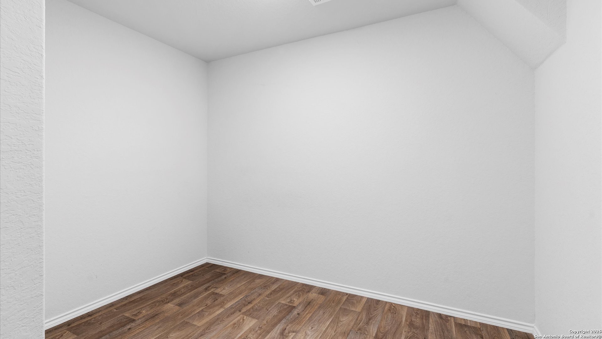 7602 Powder Gorge Converse, TX 78109 - Photo 15 of 17 a view of a small space with wooden floor