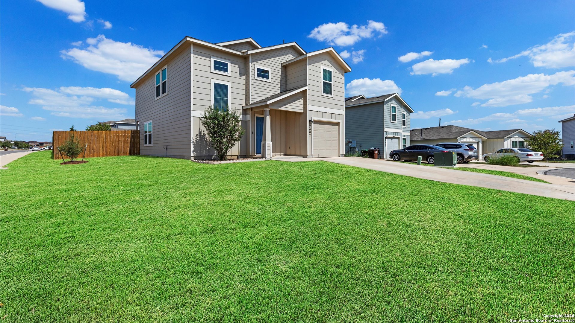 7602 Powder Gorge Converse, TX 78109 - Photo 2 of 17 a front view of a house with a yard