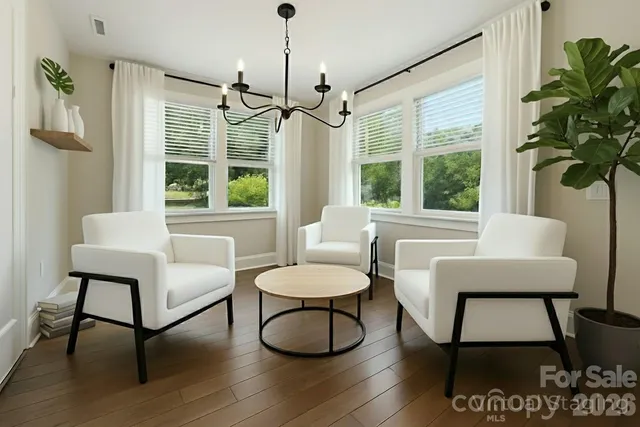 a view of a kitchen counter top space and living room