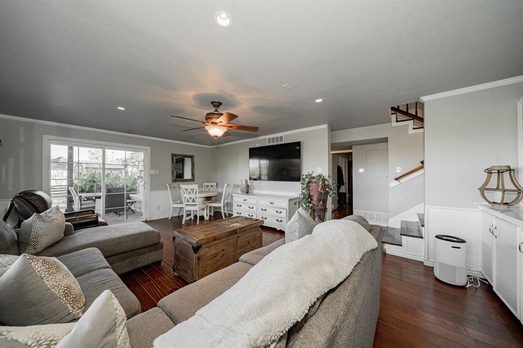 970 North Country Lane Rockwall, TX 75087 - Photo 25 of 40 a living room with furniture and a flat screen tv