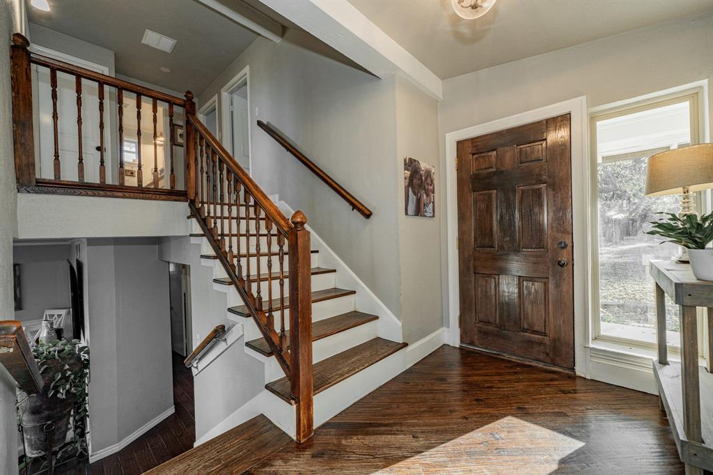 970 North Country Lane Rockwall, TX 75087 - Photo 5 of 40 a view of entryway and hall with wooden floor