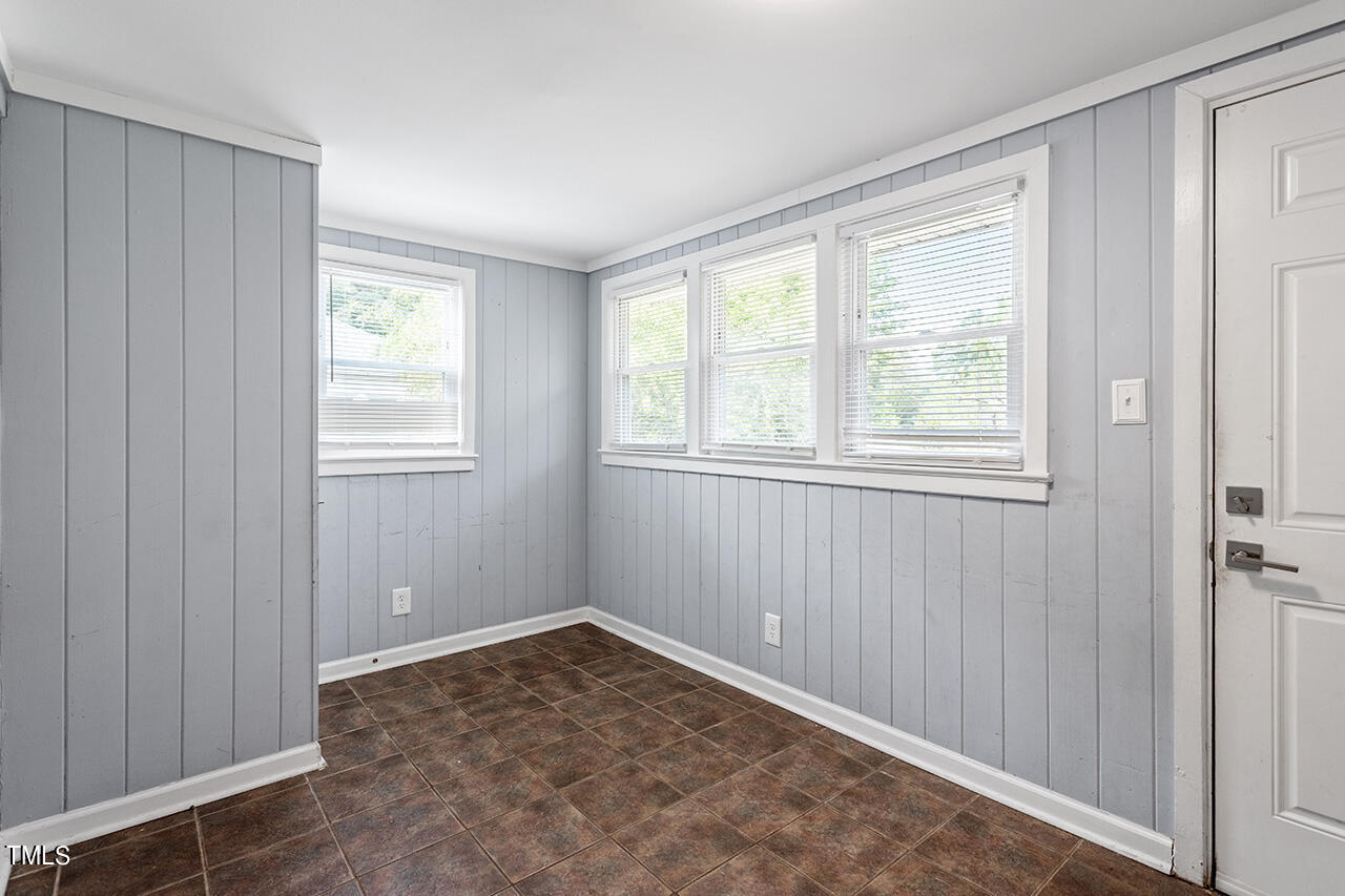 2229 Sheffield Road Raleigh, NC 27610 - Photo 24 of 30 an empty room with windows