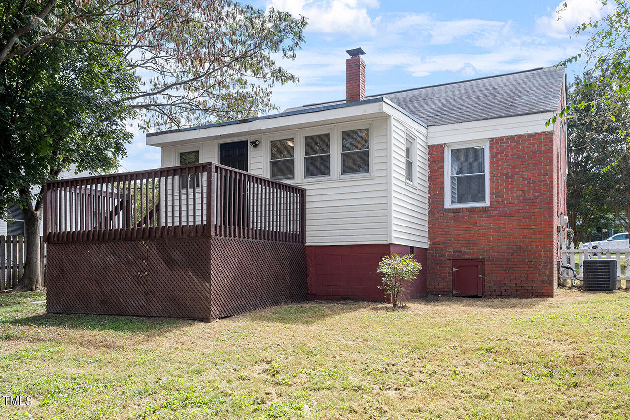 2229 Sheffield Road Raleigh, NC 27610 - Photo 29 of 30 a front view of a house with a yard