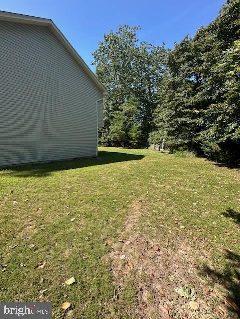 12627 Hilltop Road Lusby, MD 20657 - Photo 2 of 4 Ample right side yard space.