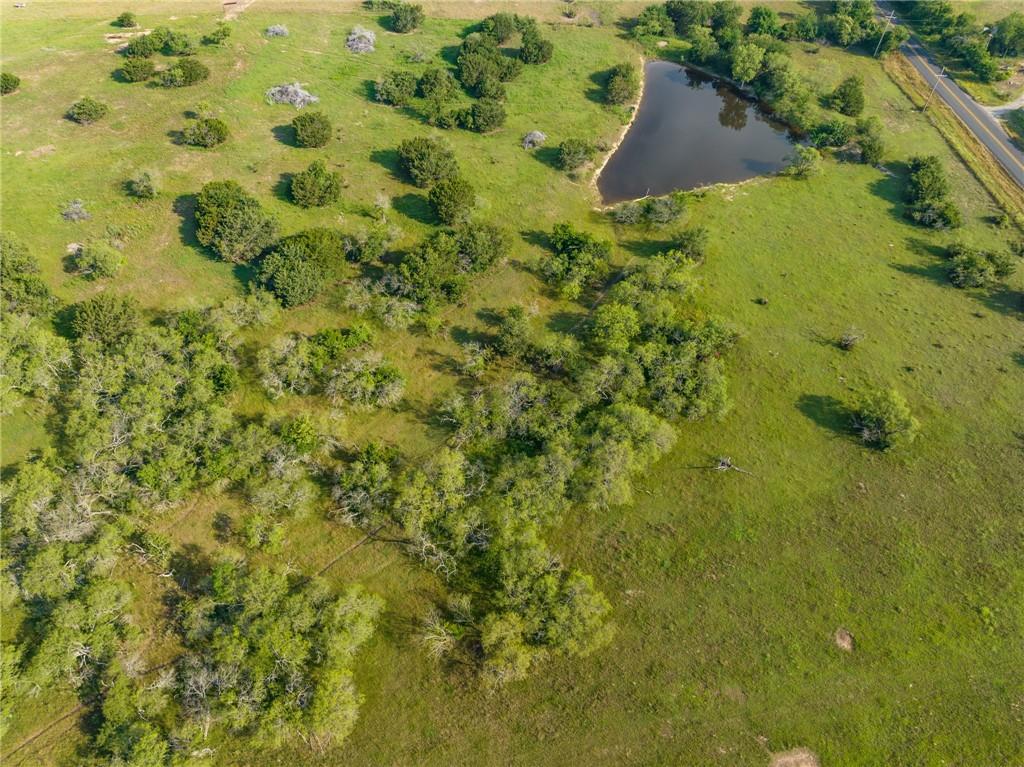 16401 Cedar Rock Parkway Crawford, TX 76638 - Photo 48 of 81 a view of a garden with a house