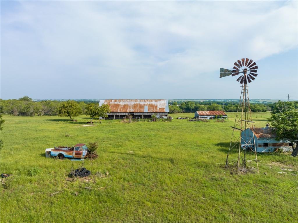 16401 Cedar Rock Parkway Crawford, TX 76638 - Photo 5 of 81 a view of a lake with a big yard