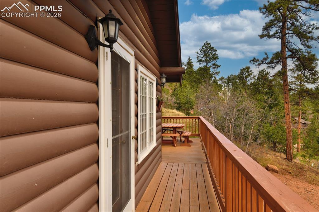9455 Mohawk Trail Cascade, CO 80809 - Photo 3 of 33 front door leads to a wonderful large deck