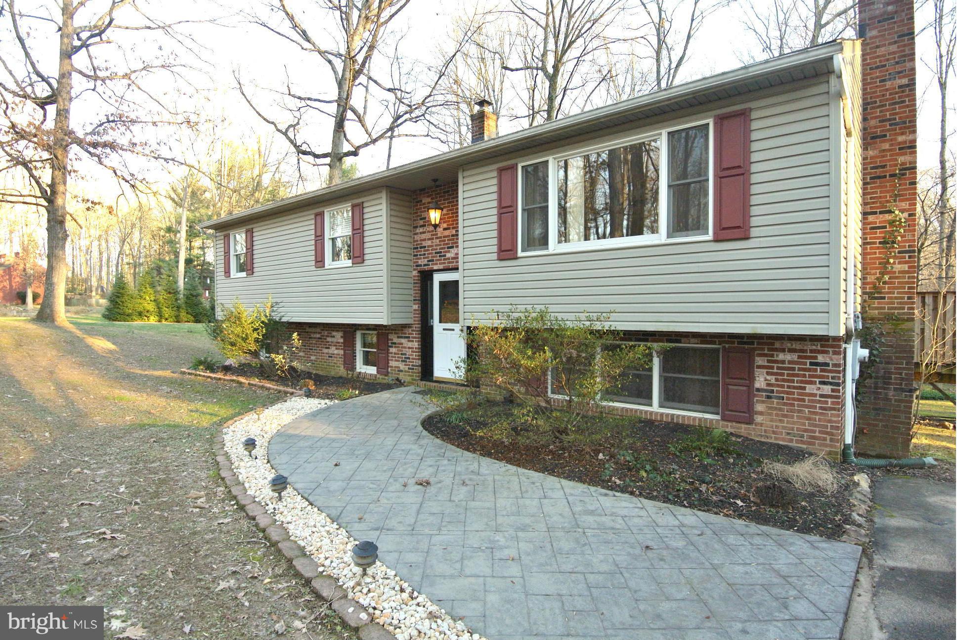 3939 Hodges Road Monkton, MD 21111 - Photo 3 of 30 Newer Roof, Siding and Stamped Concrete Walkway