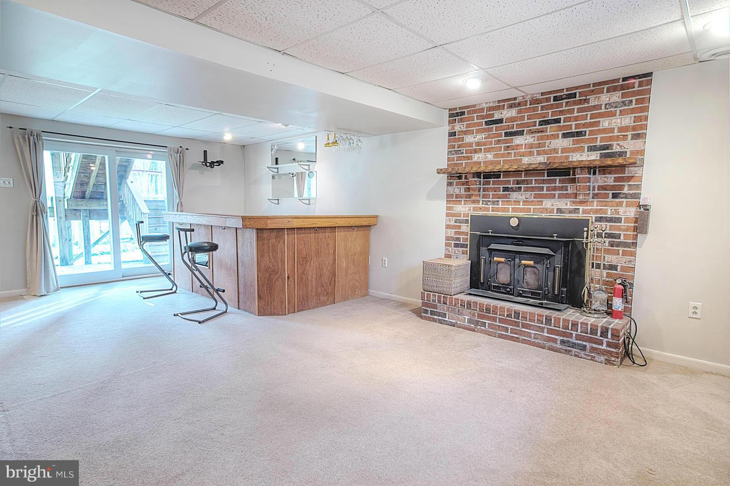 3939 Hodges Road Monkton, MD 21111 - Photo 22 of 30 Wood Burning Stove w/Brick Surround and Hearth