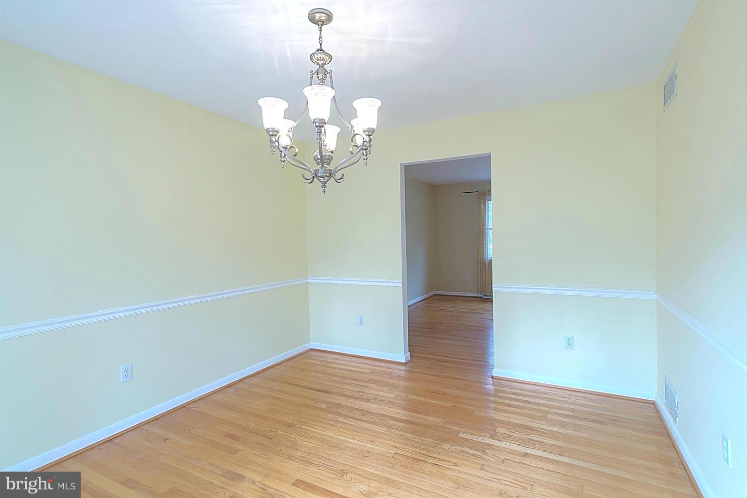 3939 Hodges Road Monkton, MD 21111 - Photo 8 of 30 Freshly Painted w/Chair Rail and Chandelier