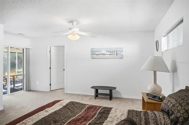 a en suite spacious bathroom with a tub double sink and a window
