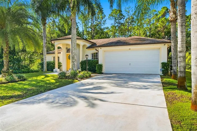a front view of house with yard