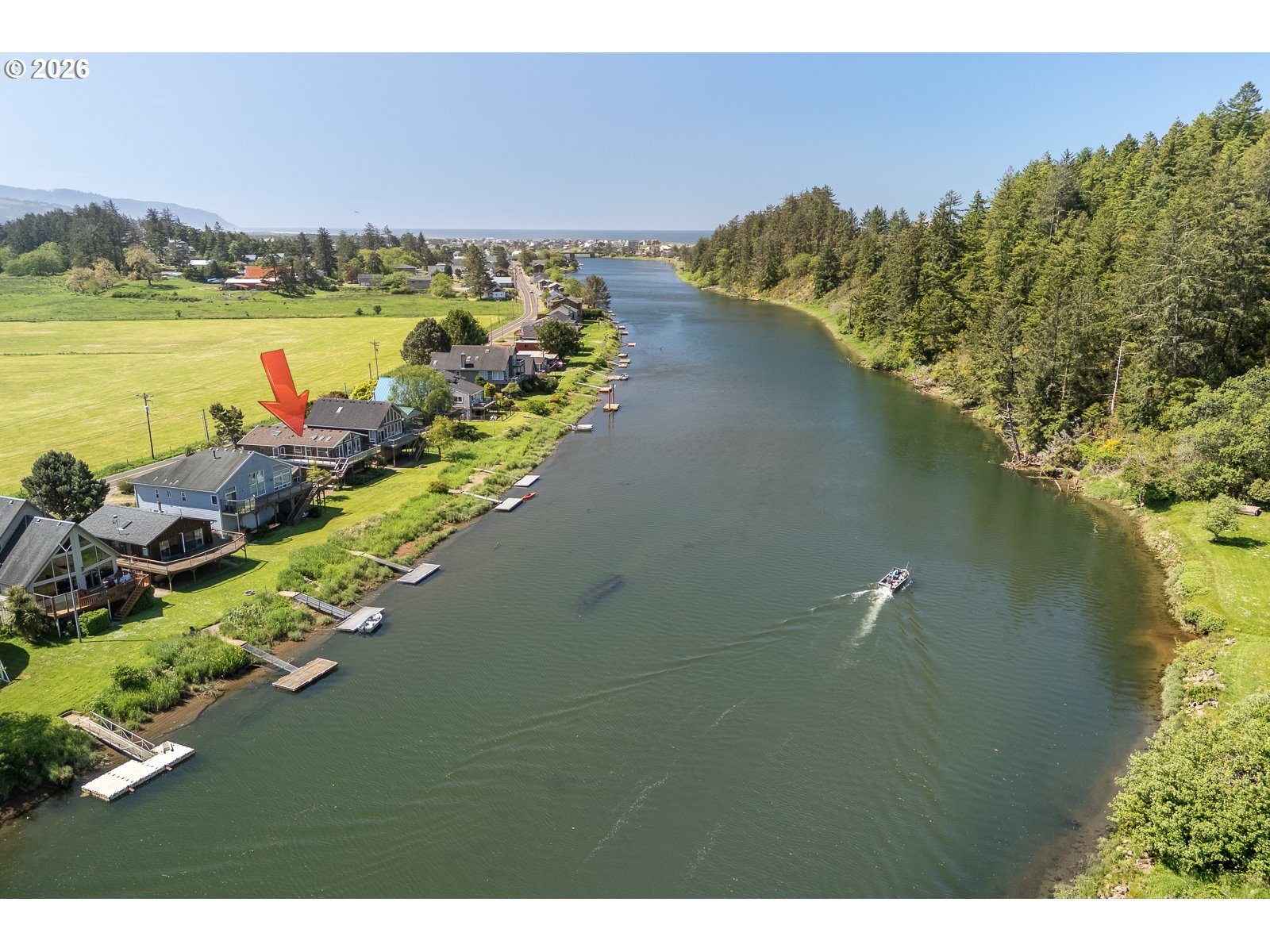 34098 Brooten Road Pacific City, OR 97135 - Photo 37 of 38 a view of a lake with a mountain in the back