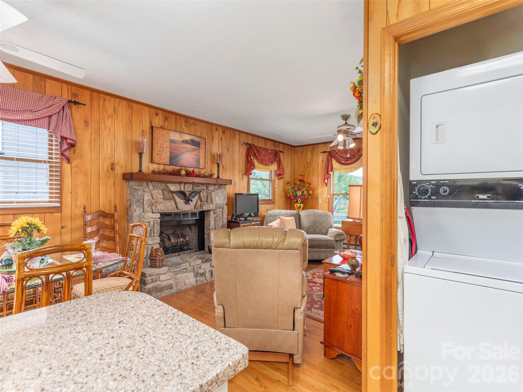 21 Flint Lane Maggie Valley, NC 28751 - Photo 13 of 30 a living room with a couch and a fireplace