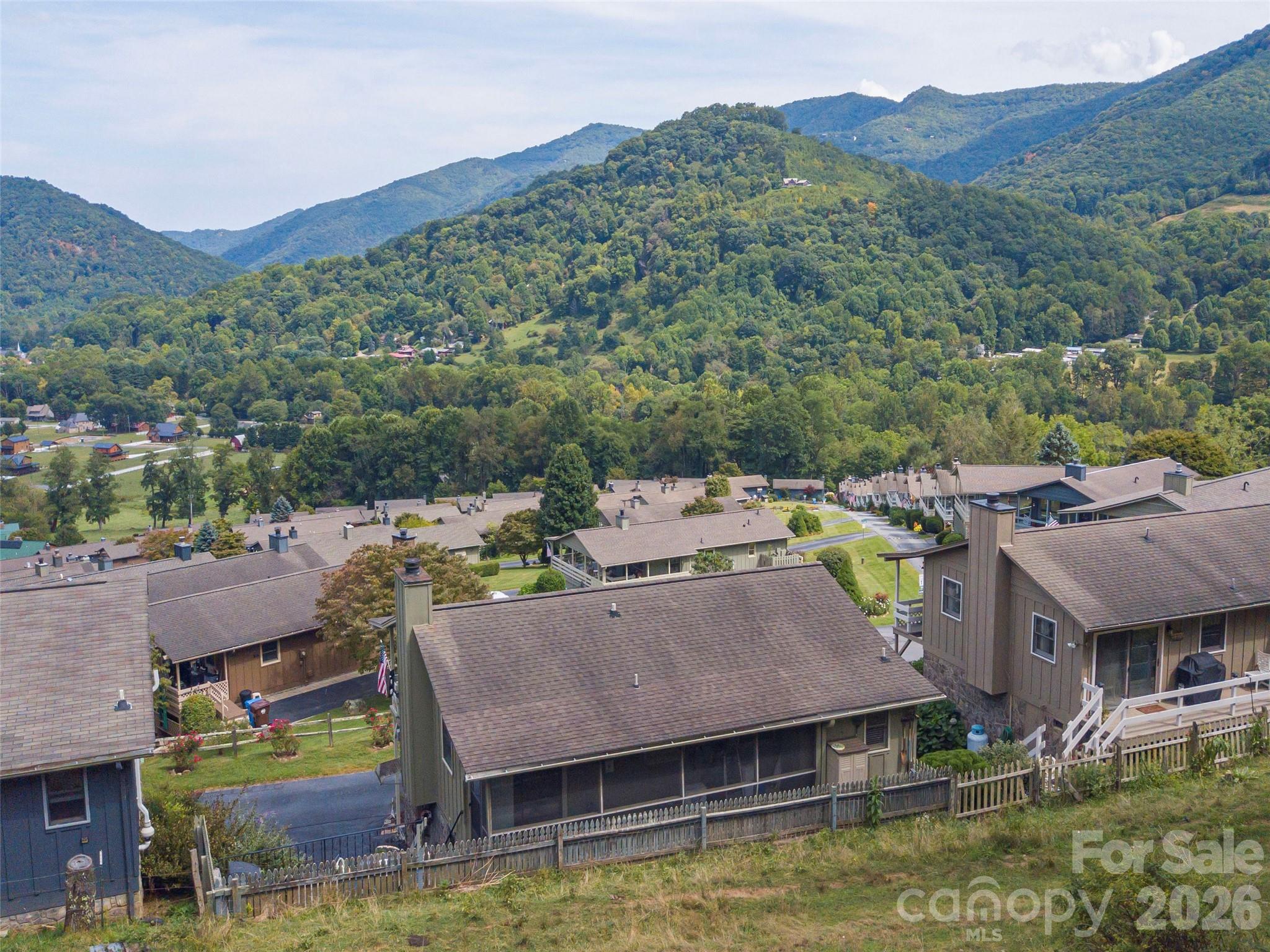 21 Flint Lane Maggie Valley, NC 28751 - Photo 27 of 30 a view of a town with mountains in the background
