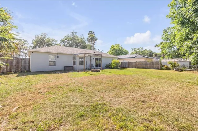 a view of a house with a swimming pool