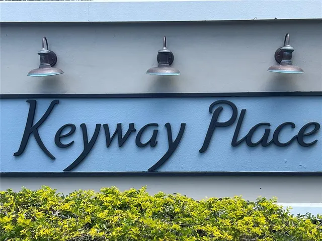 a close view of kitchen countertops and a wooden floor