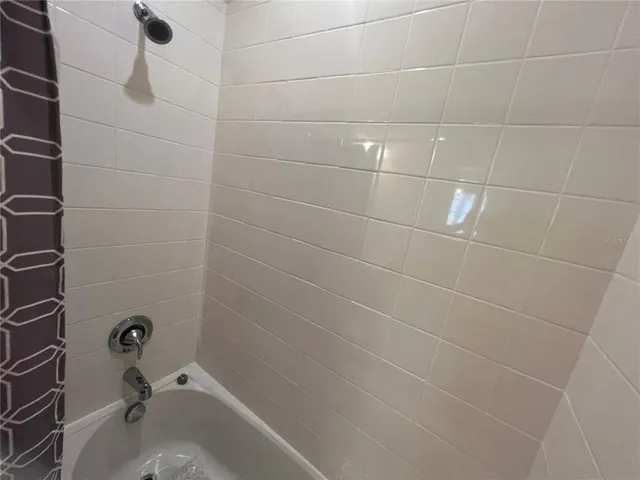 a view of a room with a large window