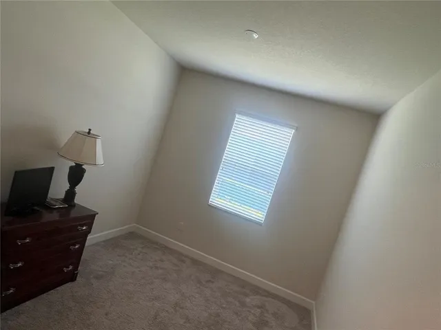 a living room with a couch and a table