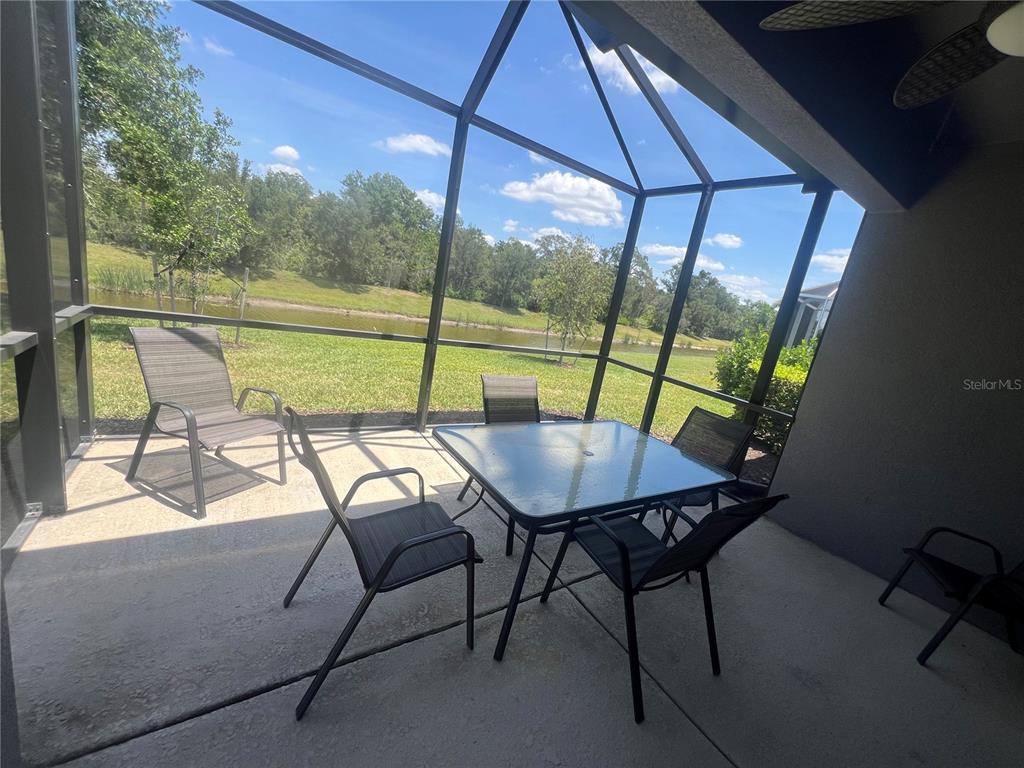 9912 Sheltering Spruce Street Englewood, FL 34223 - Photo 35 of 55 a view of chairs and city view