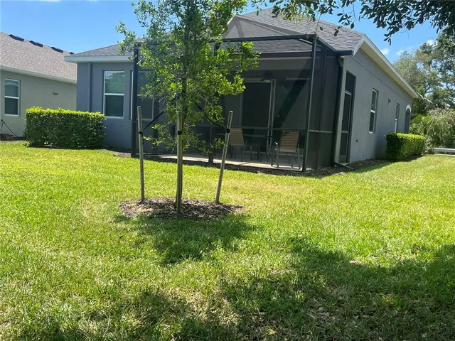 a view of a lake with a yard
