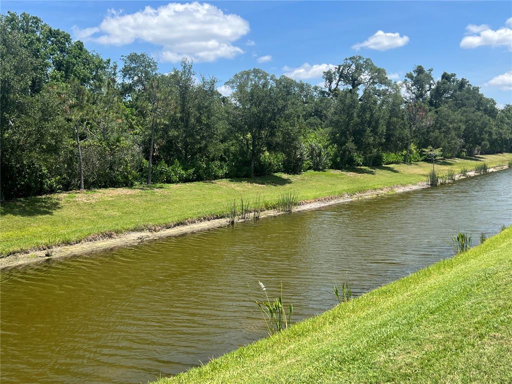 9912 Sheltering Spruce Street Englewood, FL 34223 - Photo 42 of 55 a view of a lake view