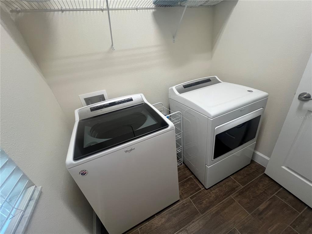 9912 Sheltering Spruce Street Englewood, FL 34223 - Photo 45 of 55 a utility room with dryer and washer