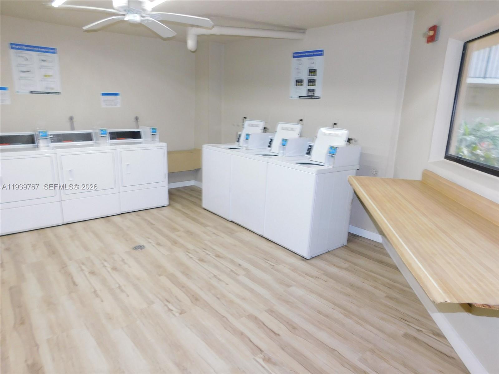 8015 Southwest 107th Avenue, Unit 111 Miami, FL 33173 - Photo 19 of 22 3 washers & 3 dryers on each floor of building