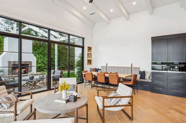 a kitchen with stainless steel appliances granite countertop a stove and a refrigerator