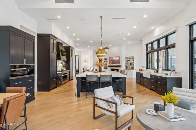 a room with a large window and sink