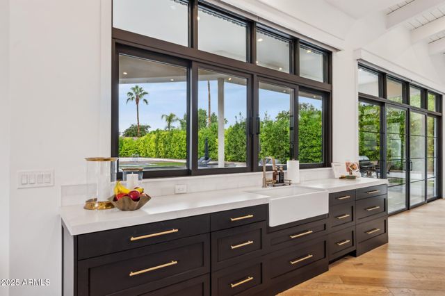a bedroom with a fireplace and a fireplace