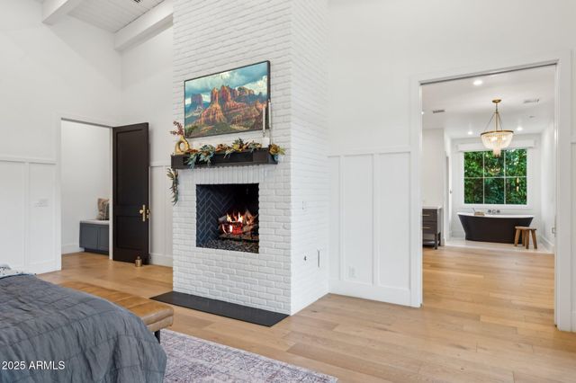 a room with a bed and a view of bathroom