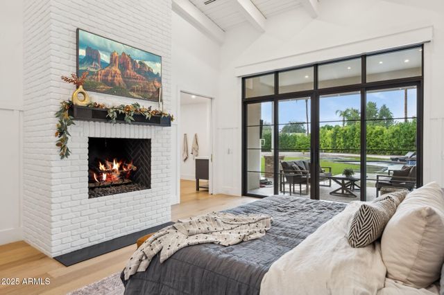 a living room with furniture a rug and a flat screen tv