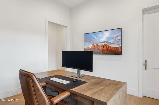 a view of a house with a swimming pool and a yard