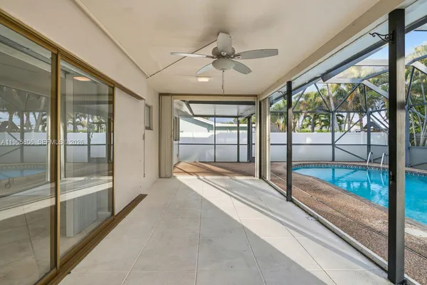 a view of an empty room and window