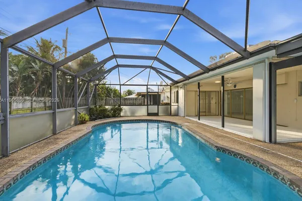 a swimming pool with yard