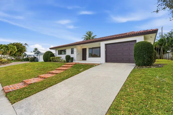 a front view of house with yard