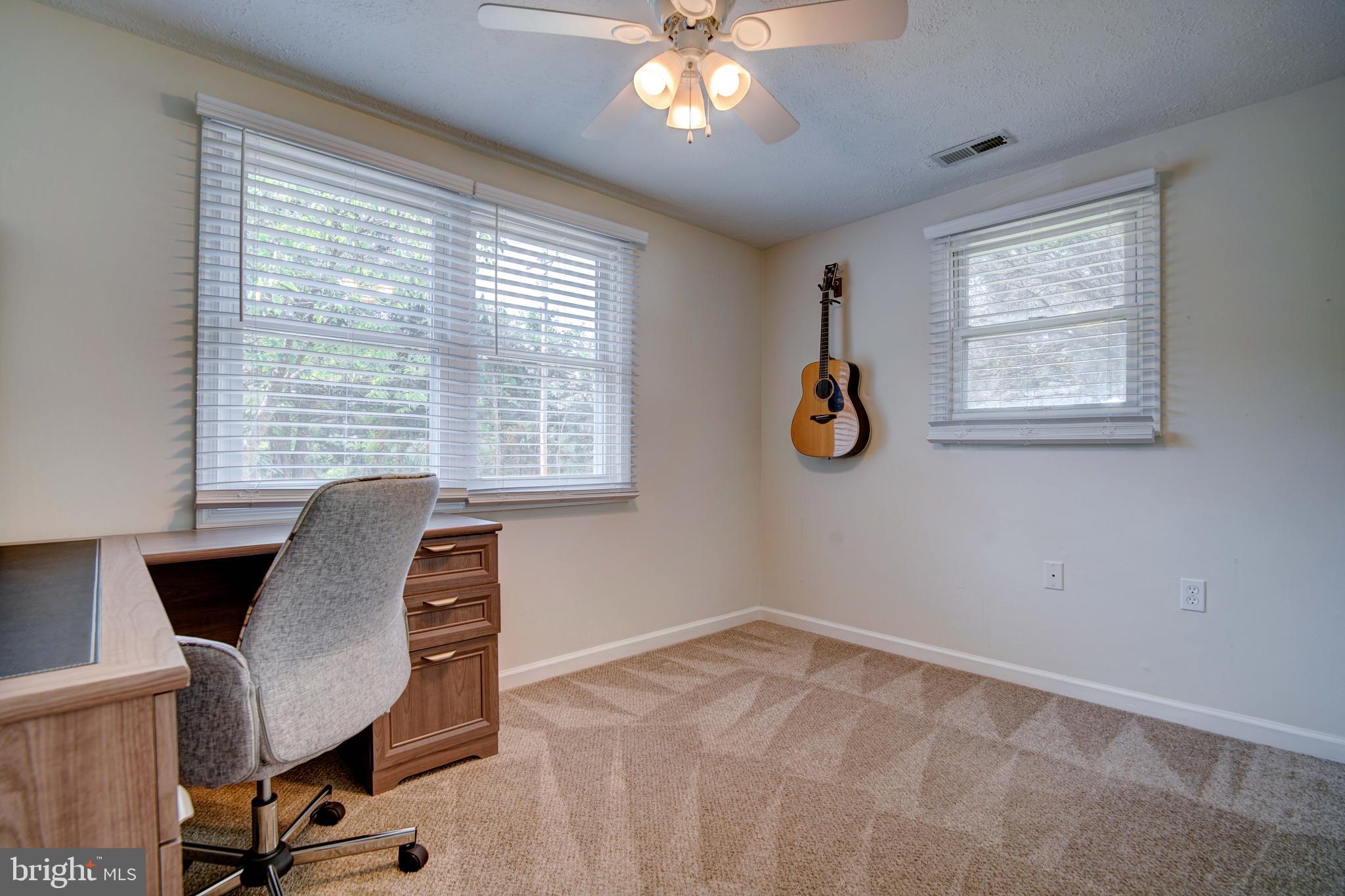 245 Newtown Road Solomons, MD 20688 - Photo 20 of 26 a workspace with furniture and a window