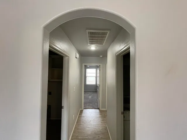 a view of hallway with stairs