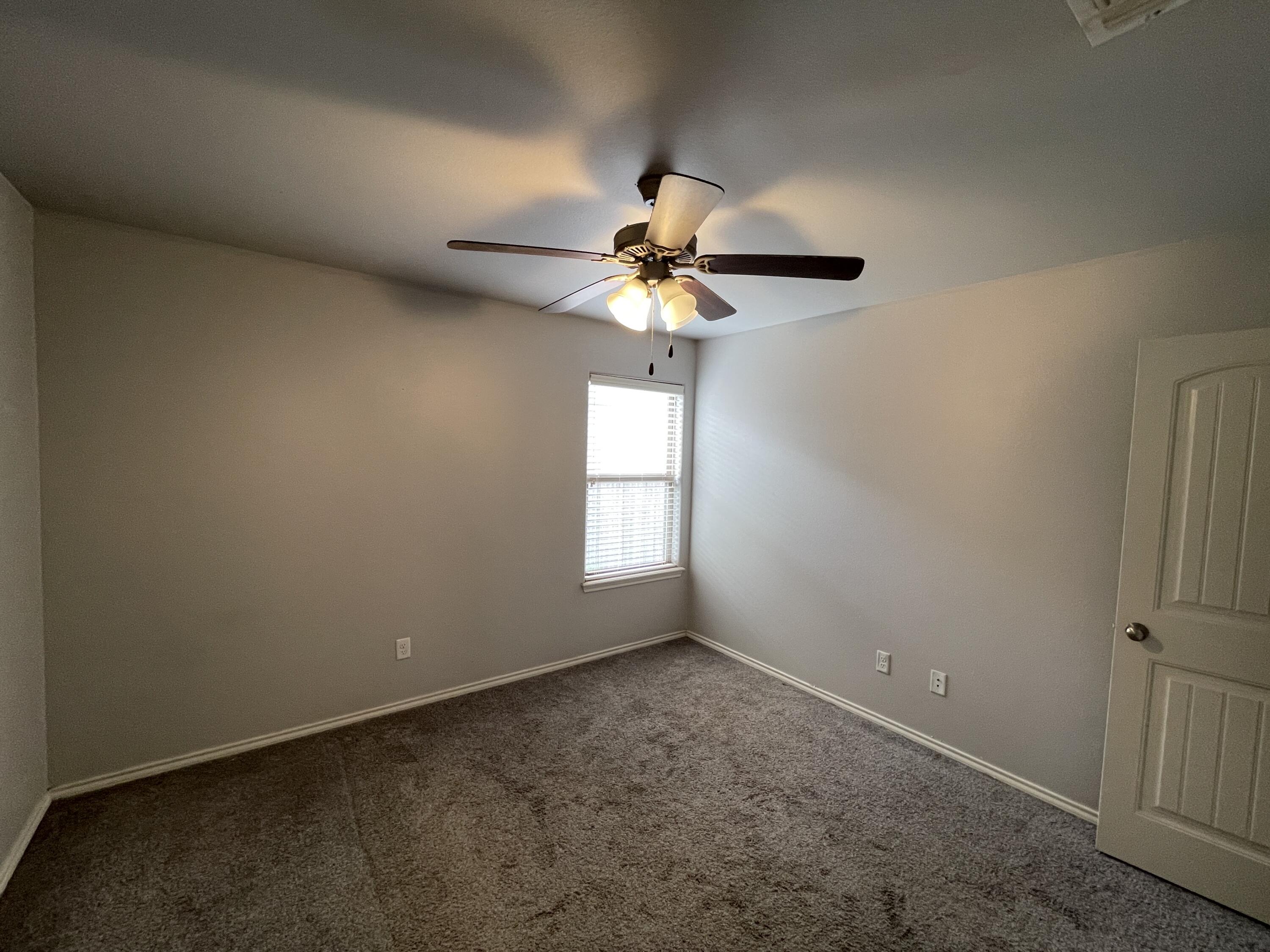 1012 Preston Trail Wolfforth, TX 79382 - Photo 18 of 21 a view of empty room with window