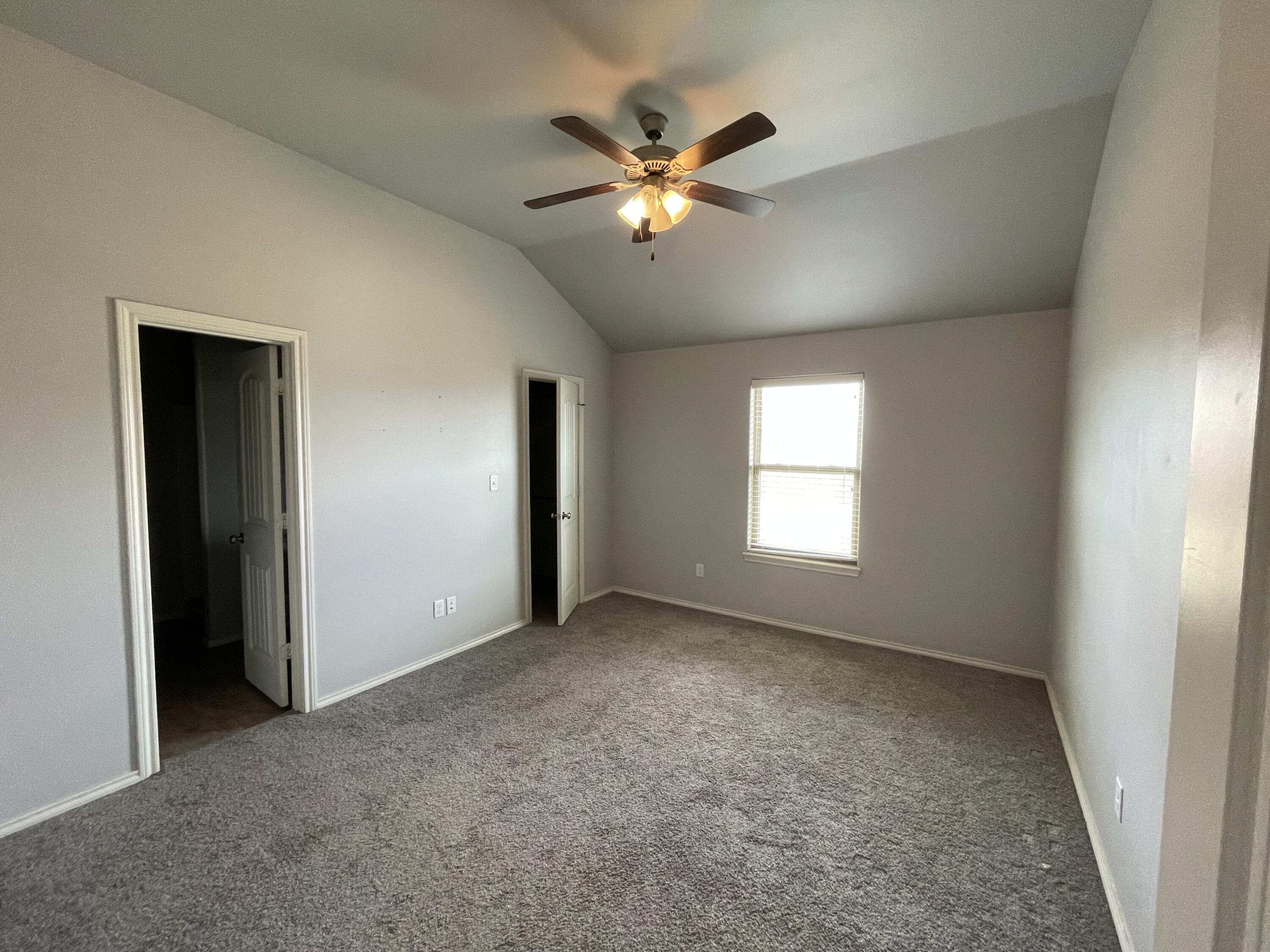 1012 Preston Trail Wolfforth, TX 79382 - Photo 8 of 21 a view of an empty room with a window