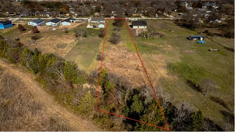 a view of residential houses with outdoor space