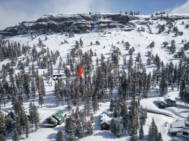 a view of snow on the road